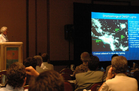 Group of People Watching a Presentation at IDA's Annual General Meeting