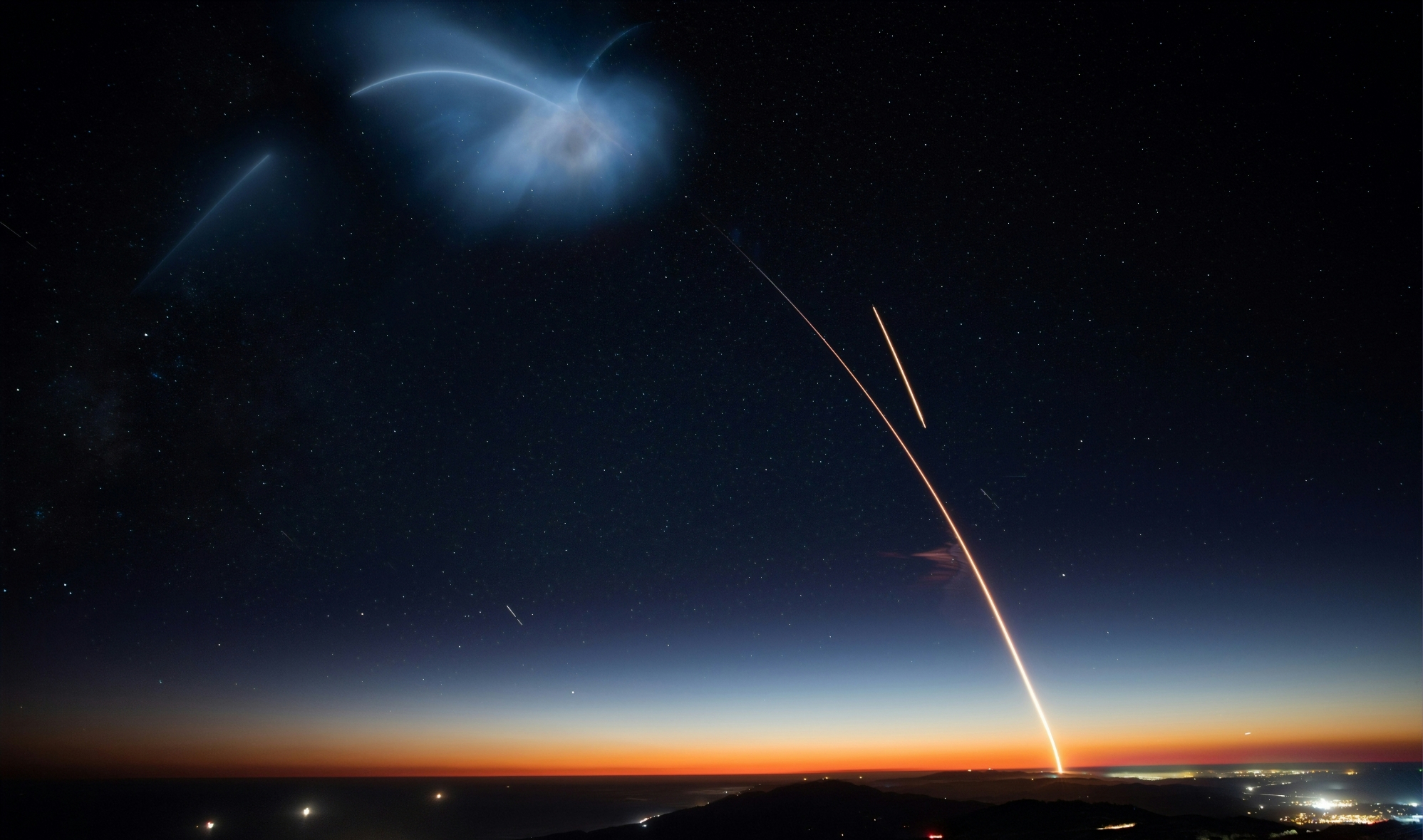 satellites glow across the night sky