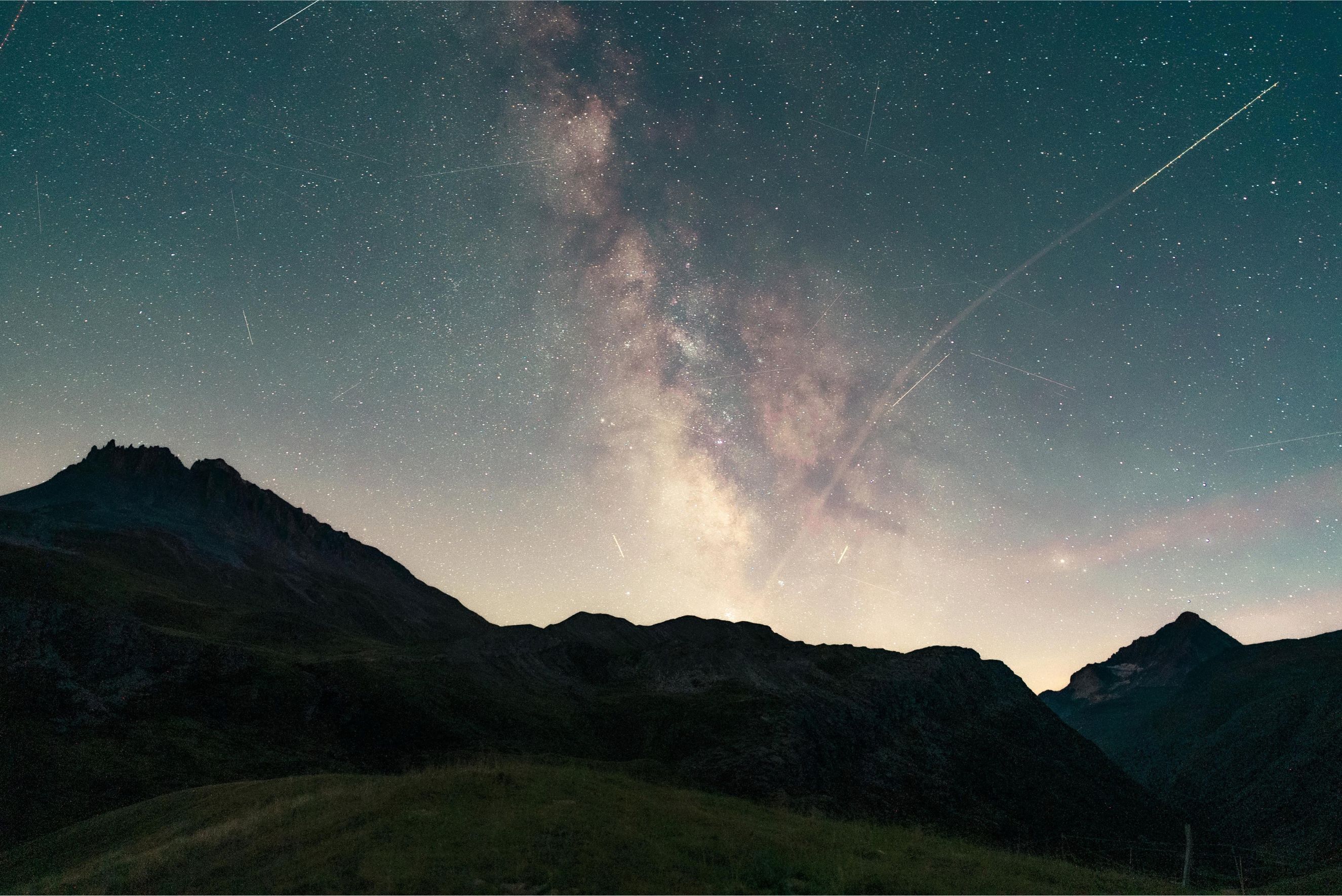 The milky way behind mountains